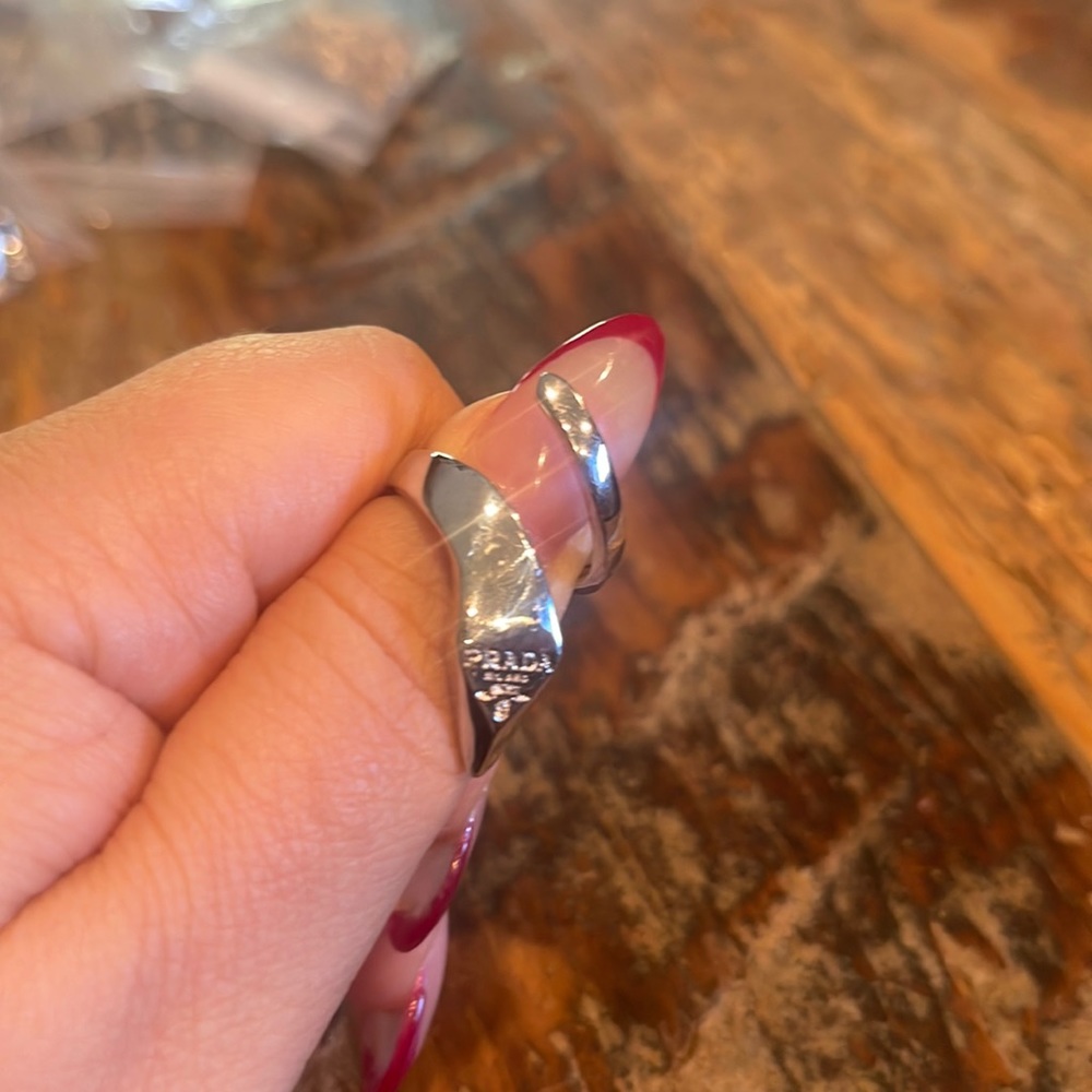 Adjustable, open silver ring. Snake design.